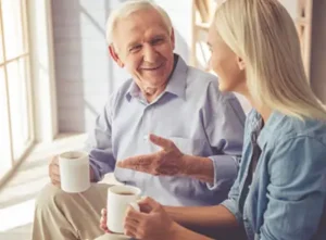 senior smiles and wants to know if his dentures are noticeable