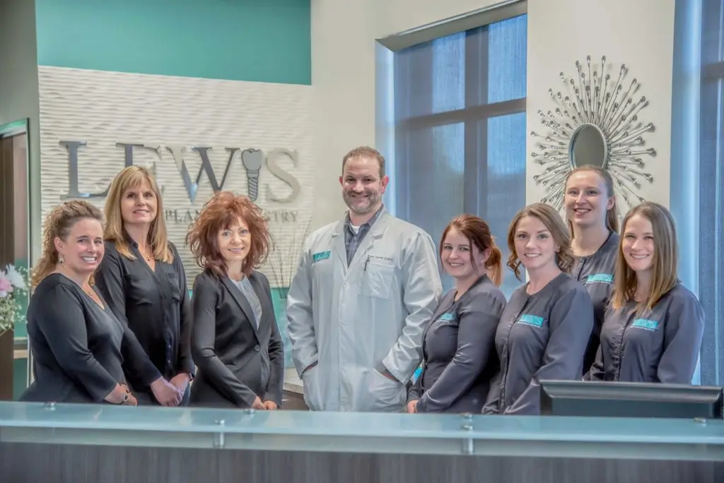 full staff photo at Lewis Family & Implant Dentistry